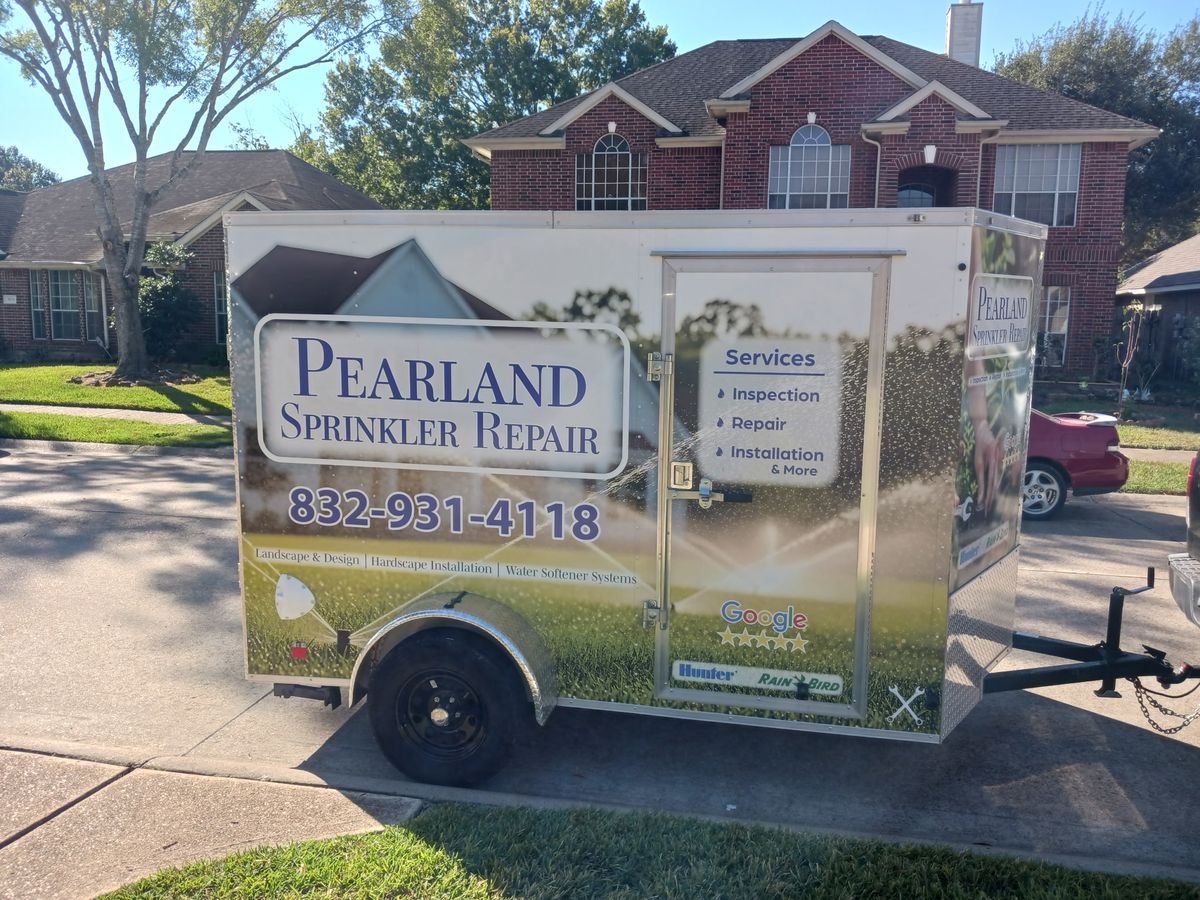 Pearland Sprinkler Repair trailer in a Pearland neighborhood